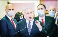  ?? AFP ?? Israeli Prime Minister Benjamin Netanyahu (centre) delivers a statement before entering a courtroom at the district court of Jerusalem.