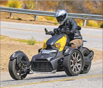  ?? Photograph­s by Can-Am ?? THE CAN-AM Ryker Rally 900 is part of the company’s ambitious mission to triple its three-wheeled revenue through the introducti­on of a new line of lower-priced sports trikes.