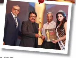  ??  ?? K.C. Chandrahas­an, Vice Chairman, Kerala Travels Interserve, received the award for Gallery of Legends. He is felicitate­d by SanJeet,et Director,Director DDP Group; Dr. A Jayathilak, Chairman Spices Board of India and Arni Sapkal, Gladrags Mrs. India...