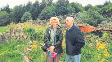  ??  ?? Barbara Kennedy and Douglas Booth at the site of the croft where Barbara’s ancestor lived and died. Read more in the column above.