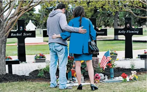  ?? JASON CONNOLLY/GETTY-AFP ?? Twenty years ago, Rachel Scott, the sister of Michael Scott, left, was one of 12 students killed in the Columbine school shooting in suburban Denver.