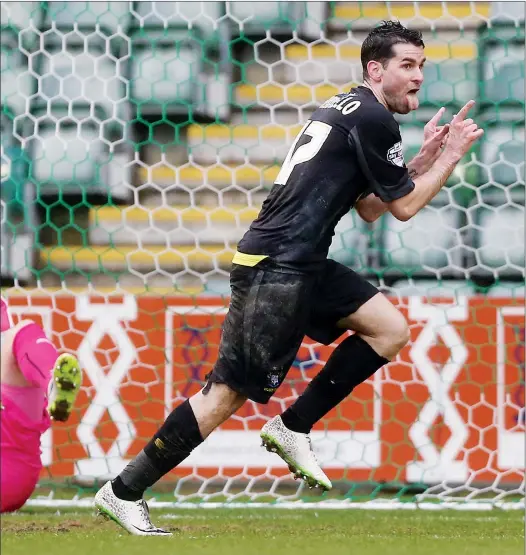  ?? PICTURES: Pinnacle ?? CENTURY: Daniel Nardiello wheels away after giving Bury the lead