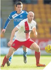  ??  ?? ■ Joe Shaughness­y shields the ball.