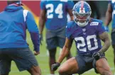  ?? SETH WENIG/AP ?? Running back Eric Gray participat­es in rookie camp at the New York Giants training facility in East Rutherford, N.J., on Friday.