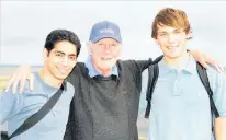  ?? Photo / Janna Dixon ?? Julian Robertson with students Amir Malek (left) and Oliver Wilson in 2008, about to board their flight to the US.