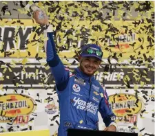  ?? AP ?? COMEBACK TRAIL: Kyle Larson celebrates after winning a NASCAR Cup Series auto race Sunday in Las Vegas.