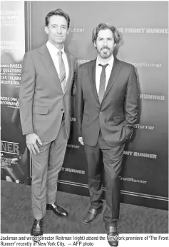  ??  ?? Jackman and writer/director Reitman (right) attend the New York premiere of ‘The Front Runner’ recently in New York City. — AFP photo