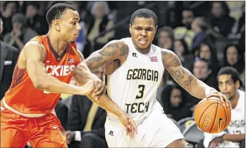  ?? DAVID GOLDMAN / ASSOCIATED PRESS ?? New Heat combo guard Marcus Georges-Hunt (right), playing for Georgia Tech against Virginia Tech in 2016, was born in Miami and lived there until age 10 when his family moved to Atlanta.
