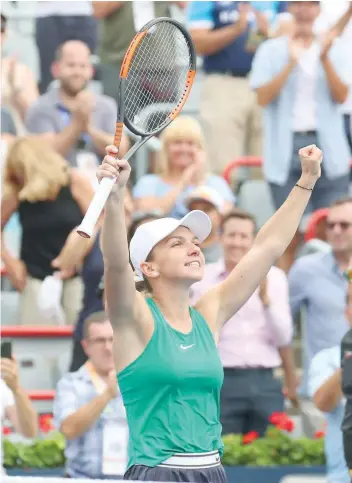  ?? — USA Today Sports ?? Halep of Romania celebrates her win against Anastasia Pavlyuchen­kova of Russia (not pictured) during the Rogers Cup at Stade IGA.