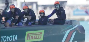  ?? — Reuters ?? Emirates Team New Zealand helmsman Peter Burling and crew after win in race four against Oracle Team USA in America’s Cup Finals at Hamilton, Bermuda.