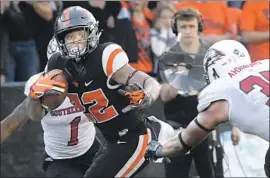  ?? Andy Cripe Associated Press ?? JERMAR JEFFERSON, who ran for 238 yards in this September game against Southern Utah, averages 6.4 yards a carry for Oregon State.