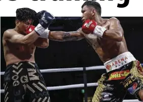  ?? Wendell Ruper Alinea ?? Paris Olympics-bound Eumir Marcial shows devastatin­g power in stopping Thai opponent Thoedsak Sinam.