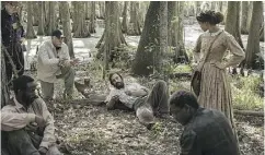  ??  ?? Director Gary Ross, third from left, works with the cast of Free State of Jones, a film about an all-but-forgotten episode in American Civil War history.