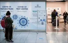  ?? (Photo MaxPPP/EPA) ?? L’aéroport de Munich, hier, où deux personnes ayant transité ont été détectées positives au variant Omicron.