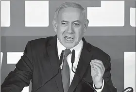  ?? AP/SEBASTIAN SCHEINER ?? Israeli Prime Minister Benjamin Netanyahu declares Thursday that charges him are “an unpreceden­ted witch hunt.”