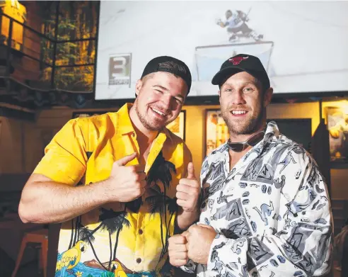  ??  ?? READY FOR ACTION: Sam Lyons and Stev Bayukhin are looking forward to watching Jeff Horn take on Terence Crawford on the big screen at Rattle n Hum tomorrow. Picture: BRENDAN RADKE