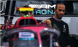  ?? Prix. Photograph: Mauro Pimentel/AFP/Getty Images ?? Lewis Hamilton in the paddock during the first day of practice for the Brazilian Grand