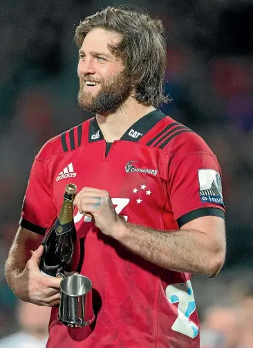  ?? GETTY IMAGES ?? Manawatu¯ loose forward Heiden Bedwell-curtis soaks up the Crusaders’ title win.