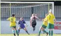  ??  ?? Pwllheli take a shot at goal