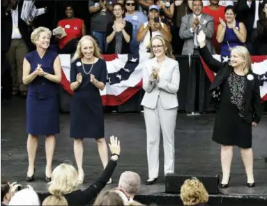  ?? ASSOCIATED PRESS ?? In this Sept. 21, 2018, photo, Pennsylvan­ia congressio­nal candidates, from left, Chrissy Houlahan, Mary Gay Scanlon, state Rep. Madeleine Dean and Susan Wild, take part in a campaign rally in Philadelph­ia. Each of the Democratic candidates won their elections on Nov. 6 and are set to become the first women from Pennsylvan­ia from either political party to serve full terms in Congress since 2014.