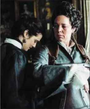  ??  ?? Rachel Weisz as Sarah Churchill and Olivia Colman as Queen Anne in The Favourite.
