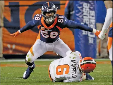  ?? Associated Press ?? Miller dealt to Rams: Denver Broncos outside linebacker Von Miller (58) reacting to sacking Cleveland Browns quarterbac­k Baker Mayfield (6) during the second half of an NFL football game in Denver, Dec. 15, 2018. A person with knowledge of the deal tells The Associated Press Monday that the Broncos are trading Miller, the franchise's career sacks leader and Super Bowl 50 MVP, to the Los Angeles Rams for two 2022 draft picks.