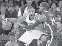  ?? Seth Wenig / Associated Press ?? Carmelo Anthony, left, and Paul George will work together in Oklahoma City after offseason deals for the All-Stars.