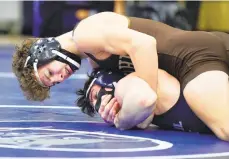  ?? RICK KINTZEL/THE MORNING CALL ?? Bethlehem Catholic’s Andrew Harmon, top, is a returning state medalist for coach Jeff Karam. Harmon will likely be out until January because of an injury.