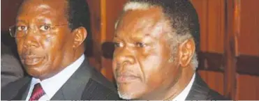  ??  ?? Former Kenya Power and Lighting managing director Samuel Gichuru (left) and former Finance minister Chris Okemo follow proceeding­s of their extraditio­n case at the High Court on July 11, 2011. A Jersey Court has already seized more than Sh520 million...