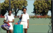  ?? WARNER BROS. PICTURES VIA AP ?? Serena (Demi Singleton), left, and Venus Williams (Saniyya Sidney) hit the court in a scene from “King Richard.” The film looks at the role their father, Richard (played by Will Smith), played in helping the duo become tennis stars.