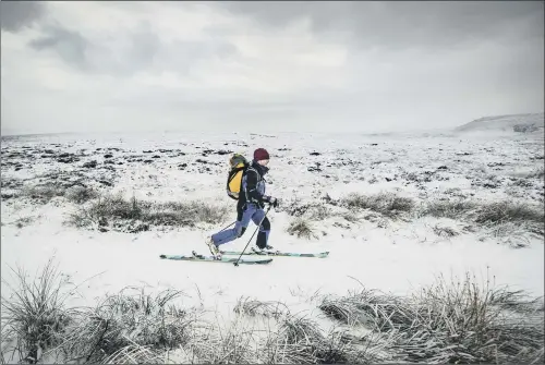  ?? PICTURE: DANNY LAWSON/PA WIRE. ?? A cross-country skier on Hope Woodlands Moor in the Peak District National Park as weather caused disruption yesterday.