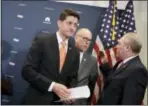  ?? THE ASSOCIATED PRESS ?? House Speaker Paul Ryan of Wisconsin, joined by House Majority Whip Steve Scalise of Louisiana, right, and Rep. Greg Walden, R-Ore., departs a news conference on Capitol Hill in Washington on Tuesday.