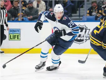  ?? JEFFREY T. BARNES/THE ASSOCIATED PRESS ?? Winnipeg Jets forward Patrik Laine was limited to 10:56 of ice time Sunday against the Buffalo Sabres as he continues to struggle offensivel­y.