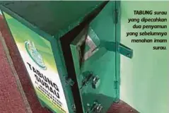  ??  ?? TABUNG surau yang dipecahkan
dua penyamun yang sebelumnya menahan imam
surau.