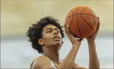  ?? For the Pittsburgh Post-Gazette ?? Lincoln Park’s Brandin Cummings shoots a free throw on Thursday.