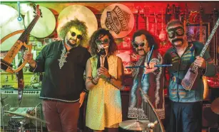  ?? (Can Erok) ?? ‘WHEN WE play live we never play the music like it is on our CDs... it is always fresh and always great fun,’ says Baba ZuLa multi-instrument­alist Levent Akman (second from right), seen here with the rest of the band.