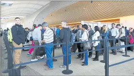  ?? GARY REYES — STAFF ARCHIVES ?? Federal officials estimate the average wait time for arriving internatio­nal passengers has decreased roughly four minutes per passenger by using facial recognitio­n technology.
