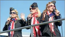  ?? / Doug Walker ?? The Ladies for Liberty perform between aerial acts at the Wings Over North Georgia air show Saturday at Richard B. Russell Regional Airport.