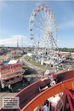  ??  ?? Funfair fans make the most of fine weather at Newcastle’s Hoppings