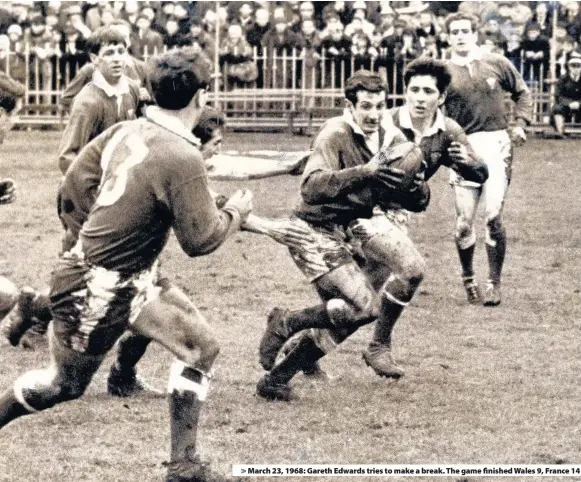  ??  ?? > March 23, 1968: Gareth Edwards tries to make a break. The game finished Wales 9, France 14