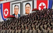  ?? REUTERS ?? North Korean leaders Kim Il Sung and Kim Jong Il are seen in the background at the main Kim Il Sung square in Pyongyang, North Korea, 9 September, 2018.