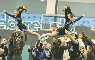  ?? ?? West Broward, pictured above winning the Region 4 competitio­n at Coral Glades High School, successful­ly defended its FHSAA state championsh­ip by winning the Class 2A Medium Non-Tumbling Division on Saturday.