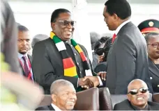  ?? ?? President Mnangagwa greets his Zambian counterpar­t President Hakainde Hichilema yesterday