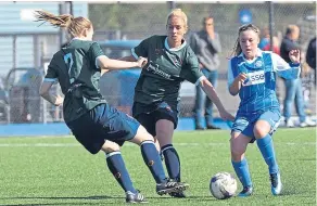  ??  ?? Rebecca McGowan takes on the Edinburgh Uni Hutchison Vale goal.