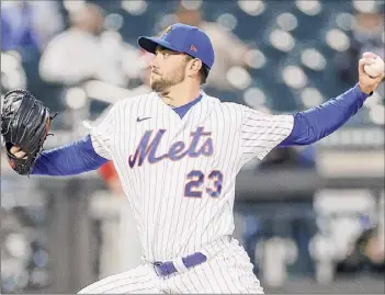  ?? Sarah Stier / Getty Images ?? David Peterson of the Mets pitches during the first inning against the Phillies at Citi Field on Wednesday. Peterson had 10 strikeouts in six innings and allowed only two hits.