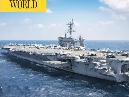  ?? MC3 BRENTON POYSER / AFP / GETTY IMAGES ?? The USS Carl Vinson, which President Donald Trump announced was sent toward the Korean peninsula, even though it was headed for Australia.