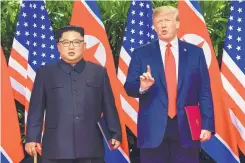  ?? SUSAN WALSH/ASSOCIATED PRESS ?? U.S. President Donald Trump makes a statement before bidding farewell to North Korea leader Kim Jong Un last week after their meetings at the Capella resort on Sentosa Island in Singapore.