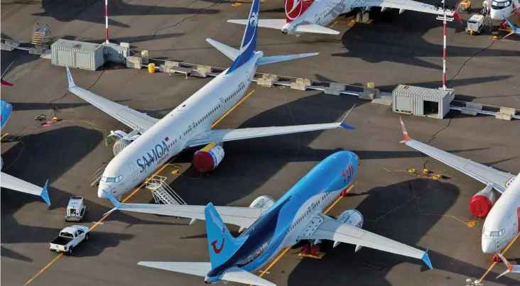  ??  ?? Samoa Airways livery Boeing 737 MAX9 amidst grounded aircraft. The Samoans put on hold the order for the plane.