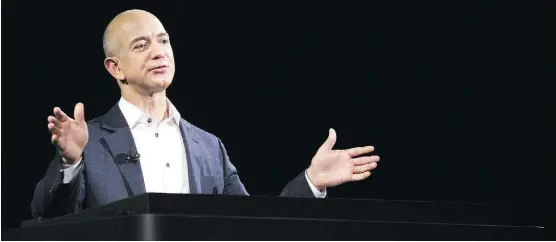  ?? DAVID MCNEW/GETTY IMAGES/FILES ?? For his second headquarte­rs, Amazon CEO Jeff Bezos is looking at cities that have strong transporta­tion links and other amenities attractive to staff.