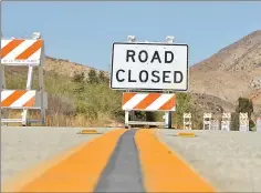  ??  ?? Signal file photo A water main break forced the closures of two of the northbound lanes of Bouquet Canyon Road at Newhall Ranch Road. The break released 50,000 gallons of water into the Santa Clara River on Tuesday.